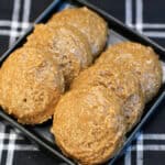 Cinnamon roll protein bites made with almond flour and cinnamon, arranged on a serving dish.