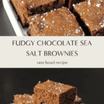 Fudgy chocolate sea salt brownies topped with flaky sea salt, sliced into squares on white serving dish.