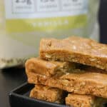 Close-up of homemade peanut butter protein bars made with oats, peanut butter, honey, and vanilla protein powder, highlighting their chewy texture.